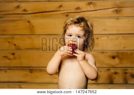 Cute Small Boy Child Eating Red Nectarine