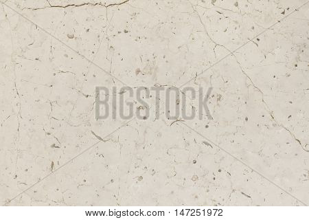 Beige light warm Trani Marble stone natural surface for bathroom or kitchen countertop. High resolution texture and pattern.