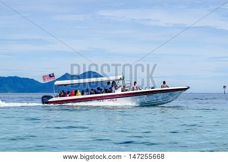 Semporna,Sabah-Sept 10,2016:Speedboat with tourists at Semporna,Sabah on 10th Sept 2016.Semporna town is a gateway for diving & snorkeling trips to the islands of Sipadan,Mabul,Mataking,Maiga & others