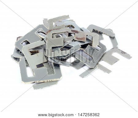 Old scrapheap of silicon steel on white background (steel for transformer)