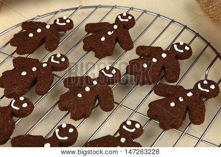 Chocolate ginger bread cookies man shape fresh from oven
