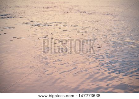 water flow ripples in river with vintage filter background