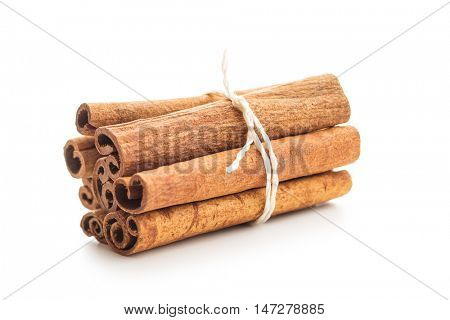 Cinnamon sticks isolated on white background.