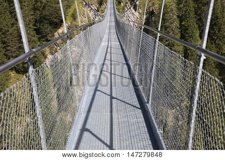 Holzgau Suspension Bridge in Lech Valley. Tirol. Austria
