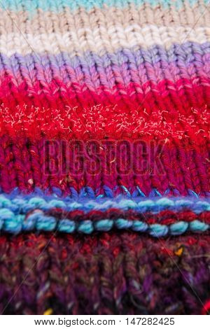 striped colorful wool texture handmade patten closeup macro blue red pink white biege purple
