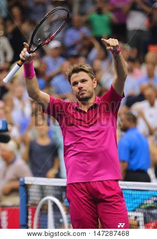 NEW YORK - SEPTEMBER 11, 2016: Three times Grand Slam champion Stanislas Wawrinka of Switzerland celebrates victory after his final match at US Open 2016 at Billie Jean King National Tennis Center