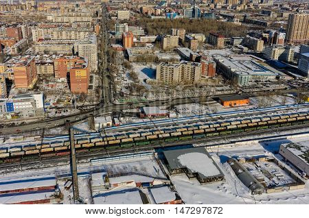 Tyumen, Russia - March 9, 2016: The railroad along 50 let VLKSM Street and intersection with Harkovskaya street