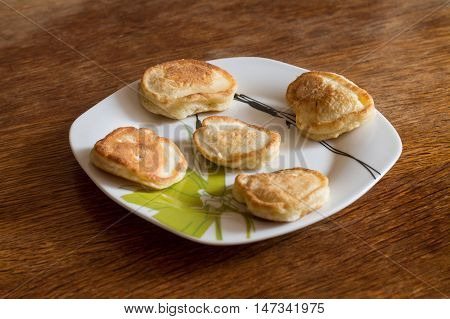 Olady - traditional ukrainian pancakes on plate