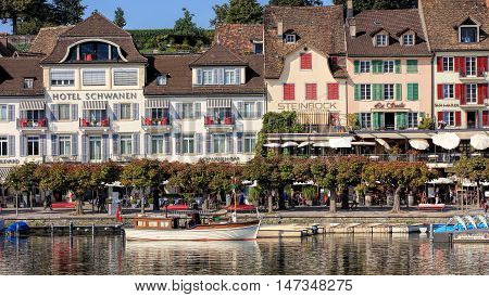 Rapperswil, Switzerland - 12 September, 2016: boats on Lake Zurich with historic buildings in the background. Rapperswil is a part of the municipality of Rapperswil-Jona in the Swiss canton of St. Gallen, located on the east side of Lake Zurich.