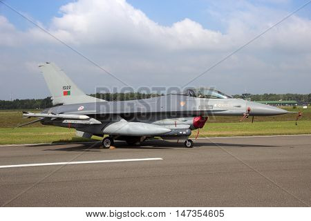 KLEINE BROGEL BELGIUM - SEP 13 2014: Portuguese Air Force F-16 fighter jet on the tarmac of Kleine Brogel airbase.