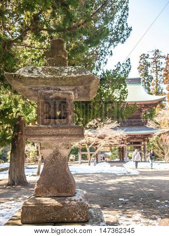 Traditional japanese stone lantern in Engaku Ji Kamakura Japan
