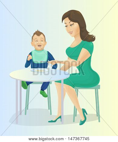 Mother feeding baby at the table. Mum giving spoon with cereals to her son