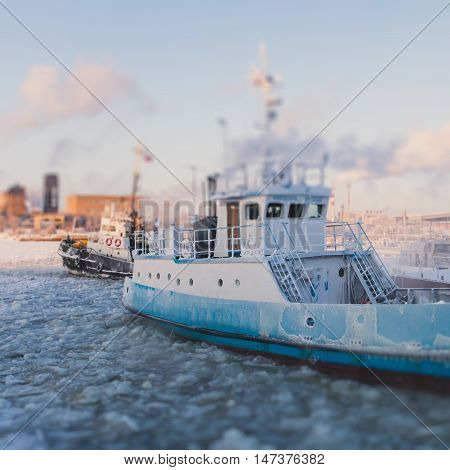 The Icebreaker Ship Trapped In Ice Tries To Break And Leave The Bay Between The Glaciers