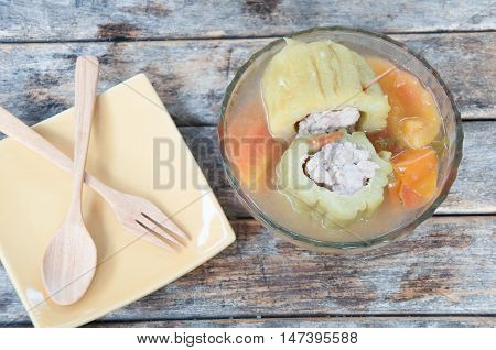 Boiled gourd stuffed with minced pork in glass bowl