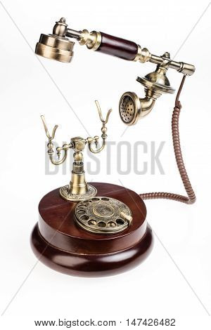 Phone in a retro style on an isolated studio backround