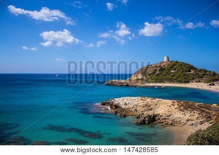 Torre de Chia bay Italy Sardinia with blue sky