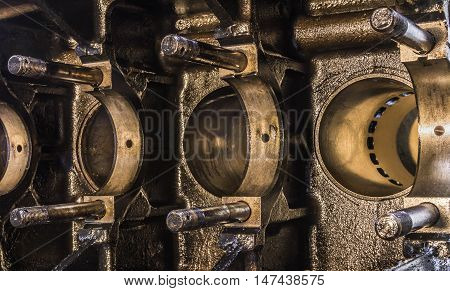 Close up of the inside of an internal combustion engine of a truck motor.