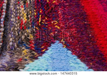 striped colorful wool texture handmade patten closeup macro blue red green yellow  biege purple orange brown