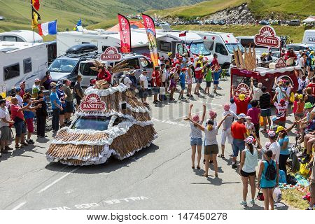 Col du Glandon France - July 23 2015: Banette vehicle during the passing of the Publicity Caravan on Col du Glandon in Alps during the stage 18 of Le Tour de France 2015. Banette is the leading brand for the artisan bread in France.