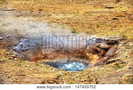 Constantly boiling Litli Geysir in Iceland, Haukadalur Valley