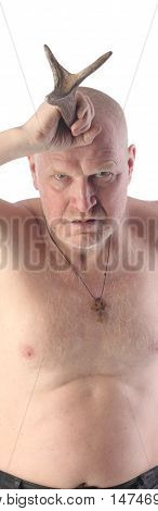 Portrait Of An Adult Man With A Naked Torso