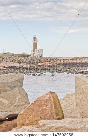 Farol In Montevideo With Blue Sky And Clouds.