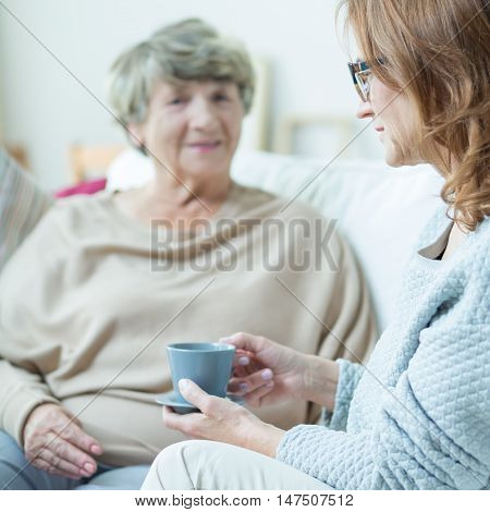 Elderly Woman During Conversation