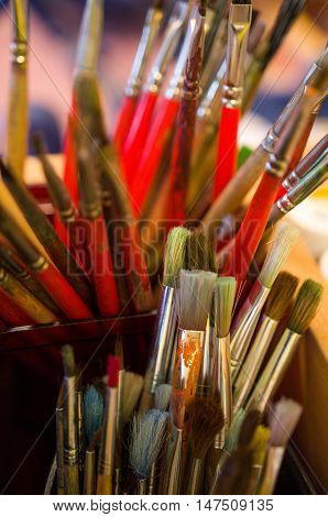 Lots of painting brushes ready to use in kindergarten.