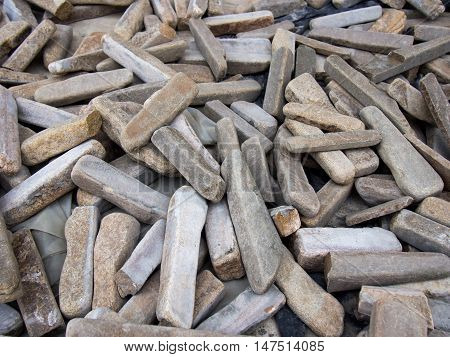 A pile of sticks from a natural stone cladding