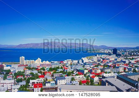 Beautiful Super Wide-angle Aerial View Of Reykjavik, Iceland With Harbor And Skyline Mountains And S