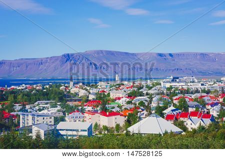 Beautiful Super Wide-angle Aerial View Of Reykjavik, Iceland With Harbor And Skyline Mountains And S