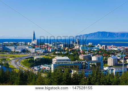 Beautiful Super Wide-angle Aerial View Of Reykjavik, Iceland With Harbor And Skyline Mountains And S