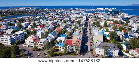 Beautiful Super Wide-angle Aerial View Of Reykjavik, Iceland With Harbor And Skyline Mountains And S