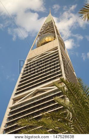 RIYADH - AUGUST 22: Sunset light at Al Faisaliah tower facade on August 22, 2016 in Riyadh, Saudi Arabia. Al Faisaliah towers is a luxury hotel and the most distinctive skyscraper in Saudi Arabia