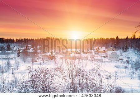 Winter sunset landscape with dramatic sky in Sweden, north scandinavian seasonal hipster background.