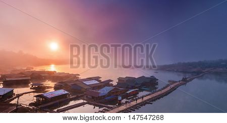 Sangkhla Buri, Thailand-January 4: Local people and tourists on the longest wooden bridge in western region of Thailand on January 4, 2015 in Sangkhla Buri, Thailand.