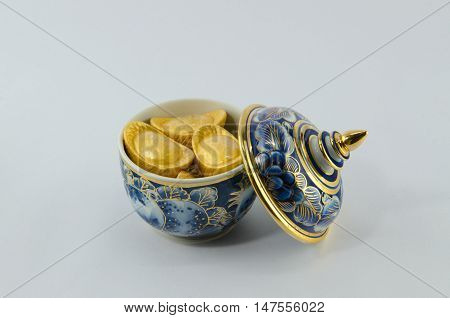 Gold ingot Chinese on Benjarong White background