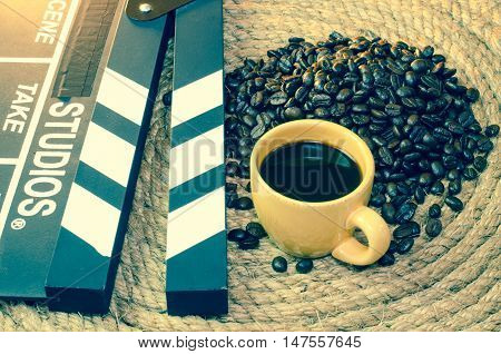 Cup of coffee with slate on a jute rope.