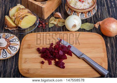 Russian vinaigrette ingredients: potatoes, beets, carrots, canned peas, pickled cabbage sunflower oil and dill