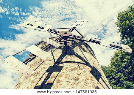 Old tower windmill in Holic Slovak republic.  Retro photo filter. 