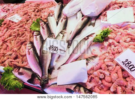 Venetian fish market - fish and prawns. The Rialto fish market is located alongside the Grand Canal near the Rialto Bridge - Venice, Italy
