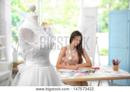 Made-up wedding dress on mannequin