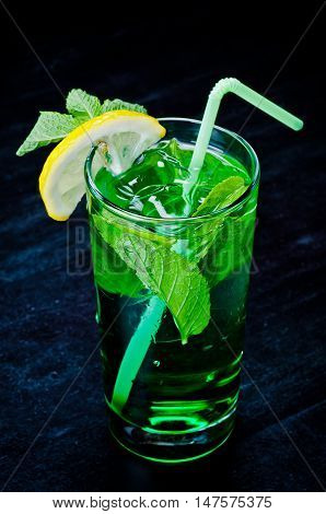 beautifull decorated motijo with ice apple lime and mint is served in the bar restaurant club