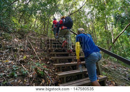 Semporna,Sabah-Sep 10,2016:Group of hikers on hiking trail,trekking in Bohey Dulang,Tun Sakaran Marine Park,Semporna,Sabah,Borneo.It is the most popular island for hiking & climbing activities.