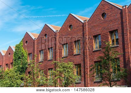 Serial houses made from red bricks seen in Berlin, Germany