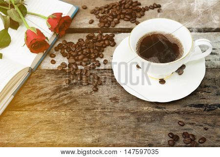 Coffee cup in Morning on old wood background