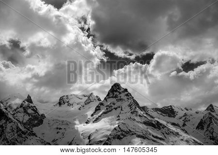 Black And White View On Evening Mountains In Sunlight Clouds