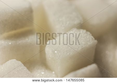 Lump sugar sweet very close shiny bokeh.