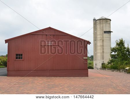 GENEVA, ILLINOIS - SEPTEMBER 9, 2016: Observation Silo and 3 Sided Barn at the Peck Farm Park Interpretative Center, a 385 acre natural retreat.