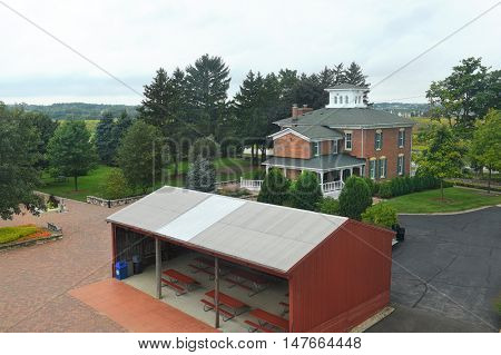 GENEVA, ILLINOIS - SEPTEMBER 9, 2016: History Gallery, Gift Shop and 3 sided Barn at the Peck Farm Park Interpretative Center, a 385 acre natural retreat.